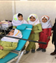 ارائه خدمات توسط تیم سلامت دندانپزشکی مرکز بهداشت ارزوئیه در یکی از مدارس این شهرستان